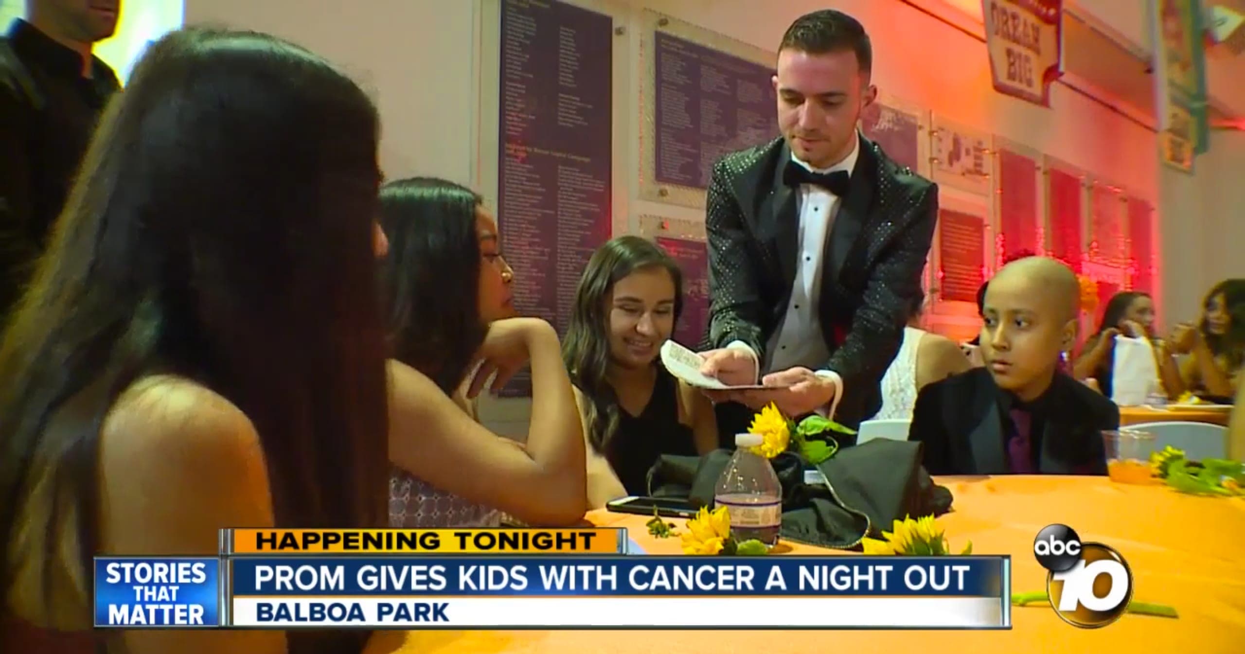 ABC 10 news segment 'Prom Gives Kids With Cancer a Night Out' showing Chris Dare performing card magic for children
