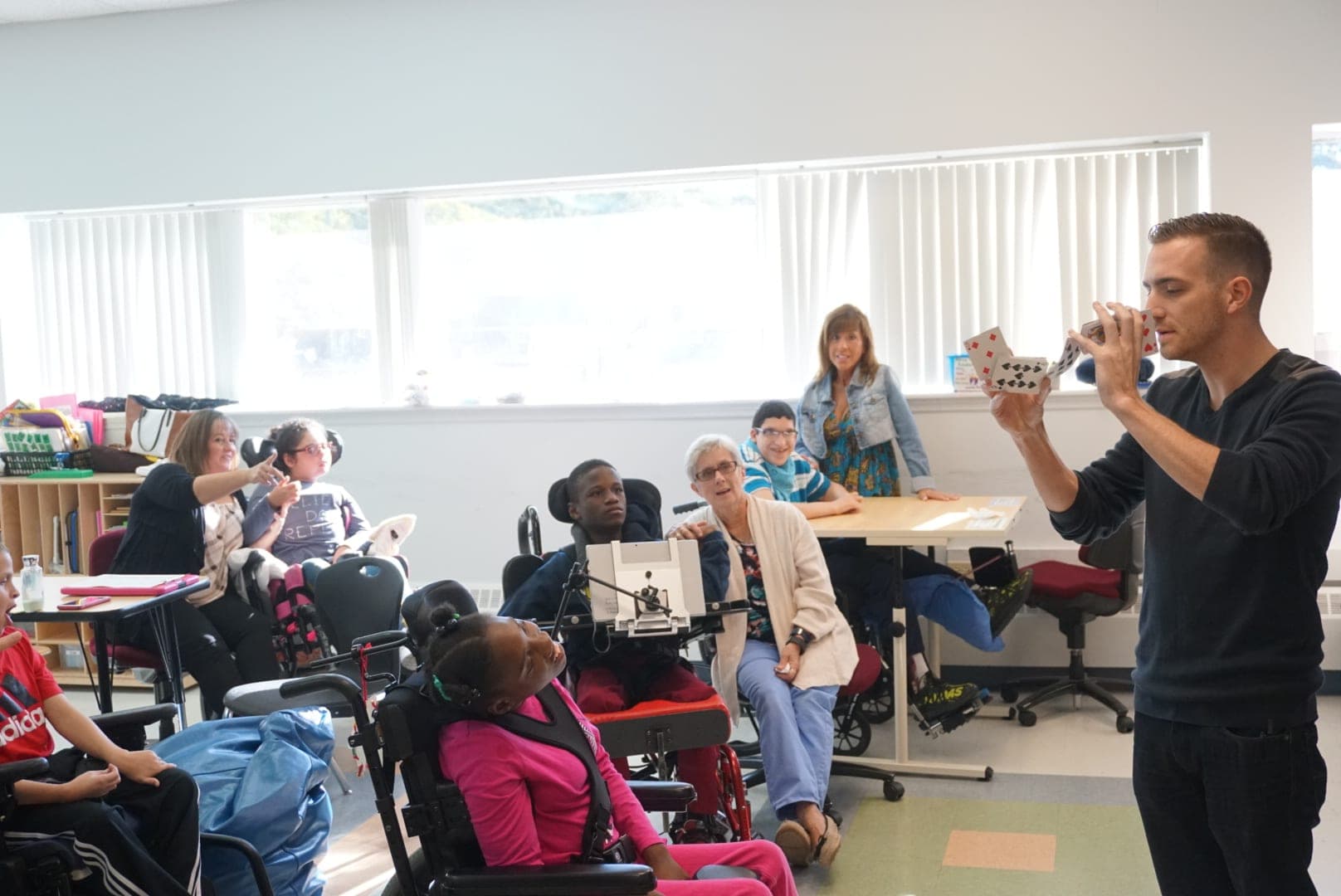 Chris Dare entertaining patients and staff at a hospital