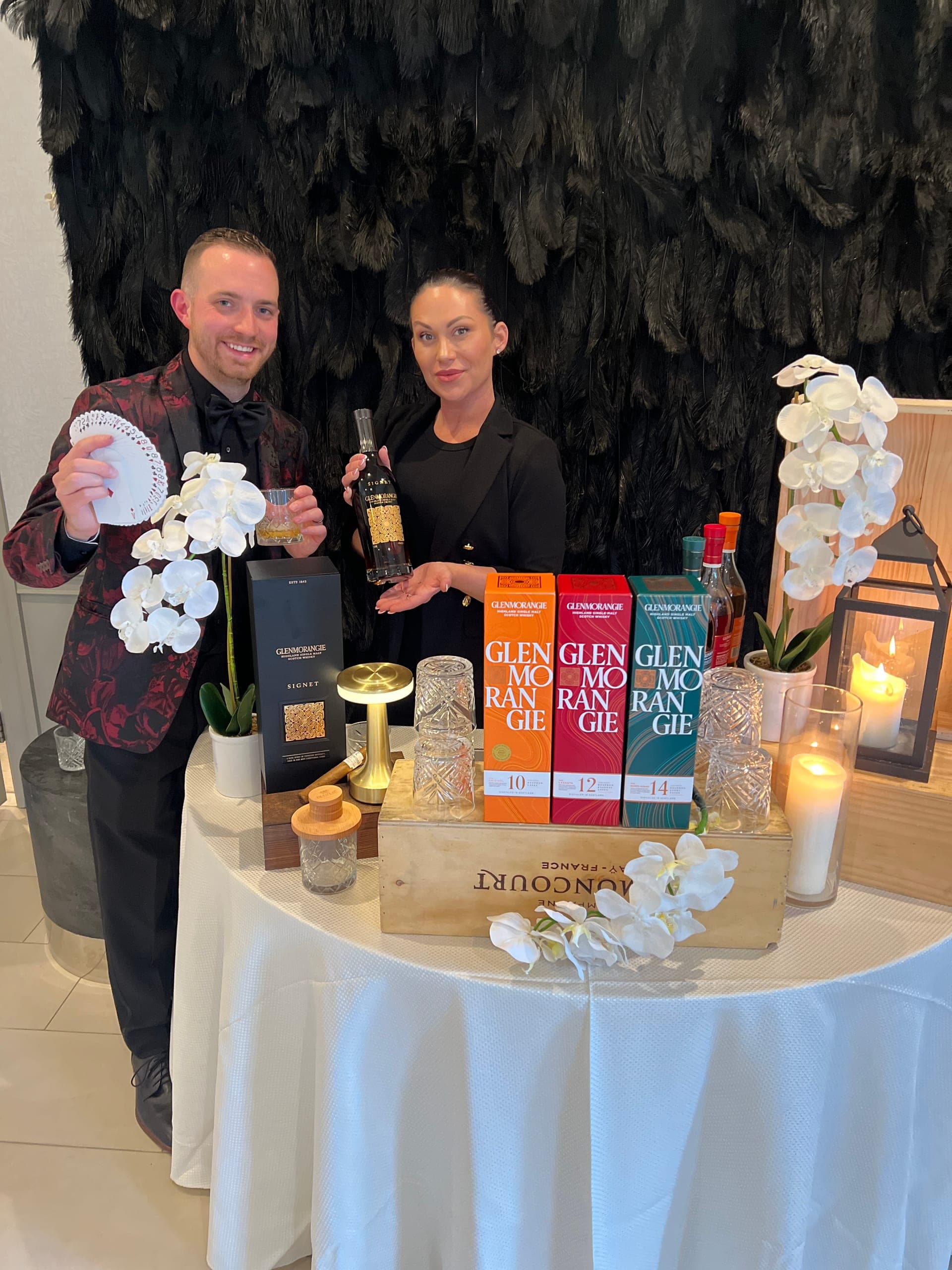 Chris Dare performing card magic at a Glenmorangie whisky product launch event